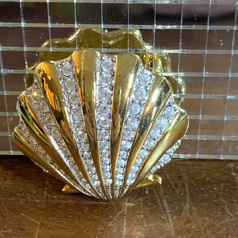Stunning shell broach. 1  1/2” x 1  1/2” gold-tone with rhinestone. Swarovski
